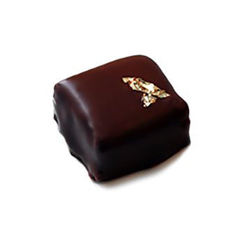 Hand dipped praline with a 100% carat gold leaf on top