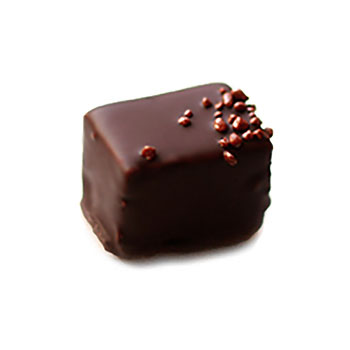 Hand dipped praline with a light specle of chocolate granulate on top