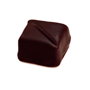 Hand dipped praline with a diagonal line on top
